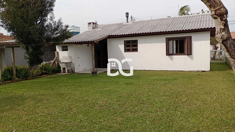 Casa aconchegante, composta por 2 dormitórios bem distribuídos: 17ª foto da galeria de imagens do imóvel