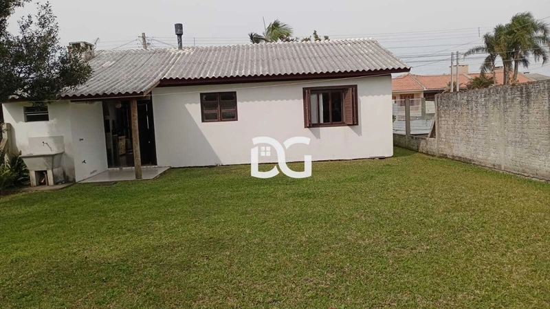 Casa aconchegante, composta por 2 dormitórios bem distribuídos: 18ª foto da galeria de imagens do imóvel