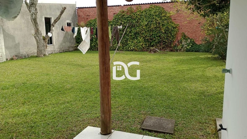 Casa aconchegante, composta por 2 dormitórios bem distribuídos: 21ª foto da galeria de imagens do imóvel