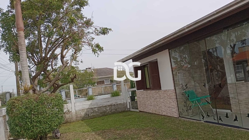 Casa aconchegante, composta por 2 dormitórios bem distribuídos: 3ª foto da galeria de imagens do imóvel