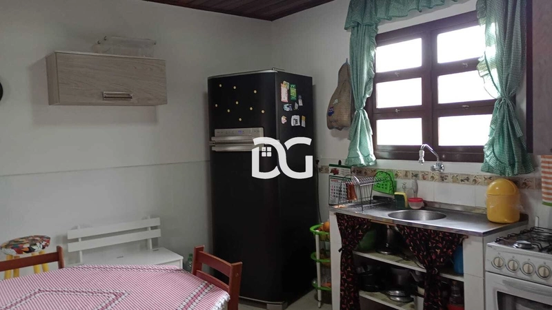Casa aconchegante, composta por 2 dormitórios bem distribuídos: 9ª foto da galeria de imagens do imóvel