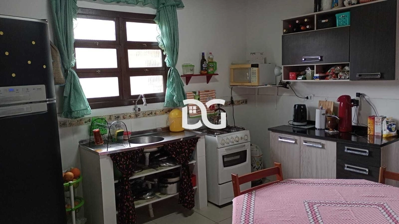 Casa aconchegante, composta por 2 dormitórios bem distribuídos: 8ª foto da galeria de imagens do imóvel