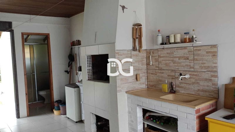 Casa aconchegante, composta por 2 dormitórios bem distribuídos: 16ª foto da galeria de imagens do imóvel
