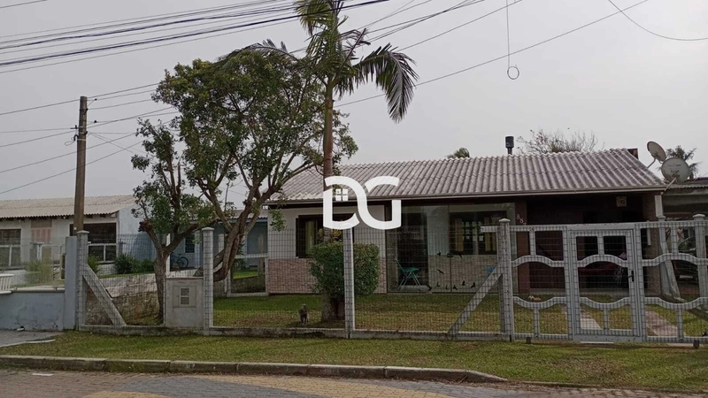 Casa aconchegante, composta por 2 dormitórios bem distribuídos: 1ª foto da galeria de imagens do imóvel