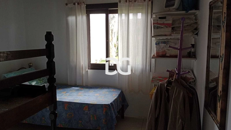 Casa aconchegante, composta por 2 dormitórios bem distribuídos: 13ª foto da galeria de imagens do imóvel
