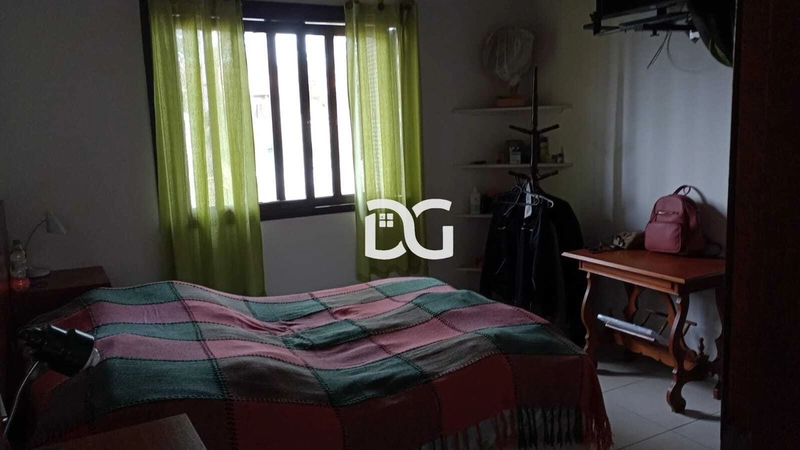 Casa aconchegante, composta por 2 dormitórios bem distribuídos: 10ª foto da galeria de imagens do imóvel