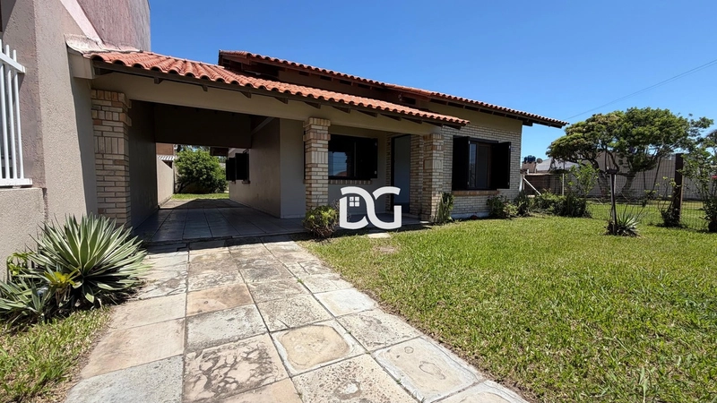 Casa composta por 3 dormitórios, sendo 1 suíte, oferecendo conforto: 2ª foto da galeria de imagens do imóvel