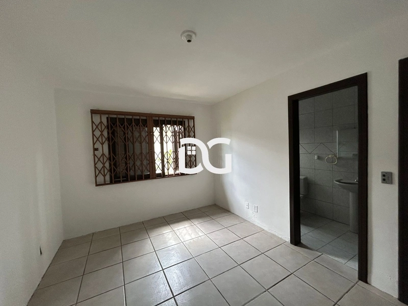 Casa composta por 3 dormitórios, sendo 1 suíte, oferecendo conforto: 15ª foto da galeria de imagens do imóvel