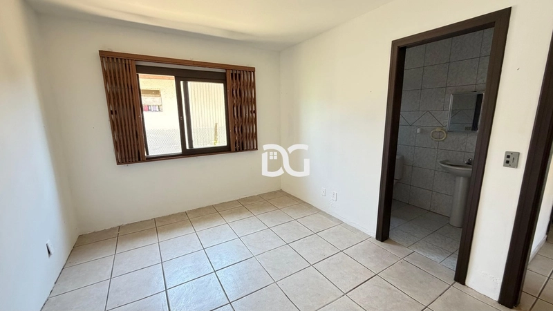 Casa composta por 3 dormitórios, sendo 1 suíte, oferecendo conforto: 10ª foto da galeria de imagens do imóvel