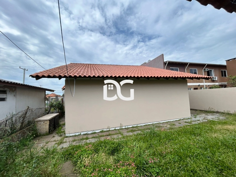 Casa composta por 3 dormitórios, sendo 1 suíte, oferecendo conforto: 17ª foto da galeria de imagens do imóvel