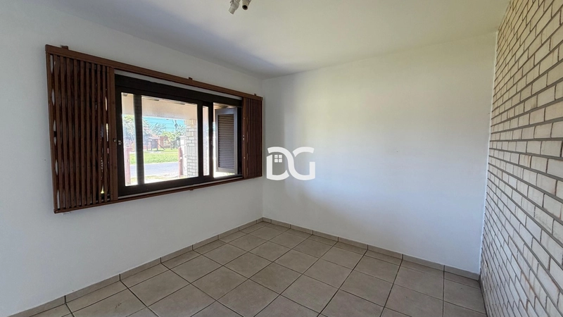 Casa composta por 3 dormitórios, sendo 1 suíte, oferecendo conforto: 6ª foto da galeria de imagens do imóvel