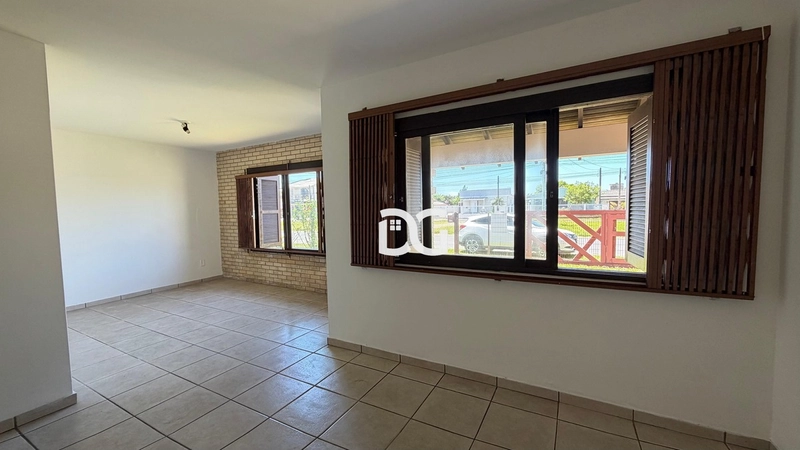 Casa composta por 3 dormitórios, sendo 1 suíte, oferecendo conforto: 5ª foto da galeria de imagens do imóvel