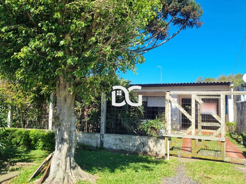 Casa aconchegante composta por 3 dormitórios, sendo 1 suíte: 1ª foto da galeria de imagens do imóvel