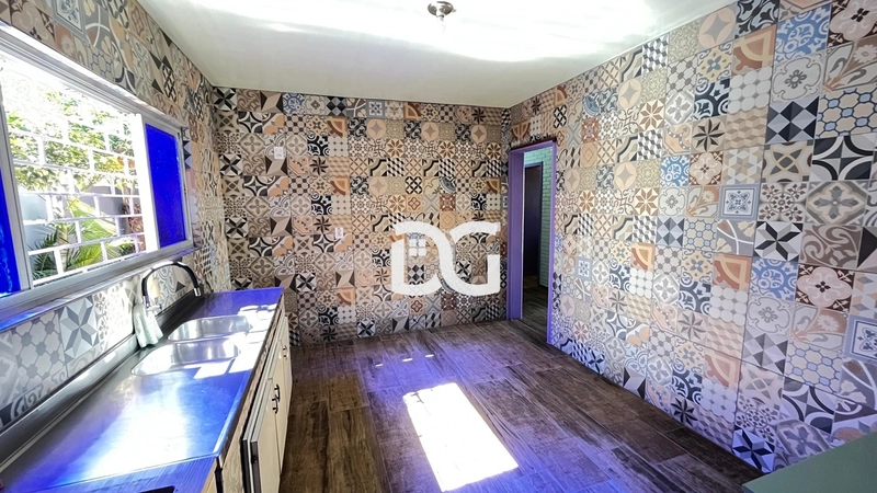 Casa aconchegante composta por 3 dormitórios, banheiro social e lavabo: 4ª foto da galeria de imagens do imóvel