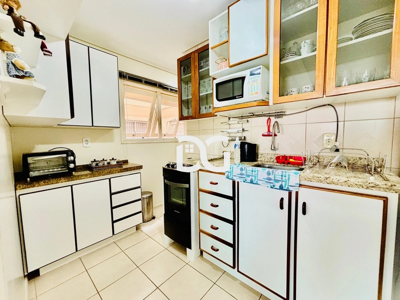 Apartamento aconchegante, ideal para quem busca praticidade e conforto: 12ª foto da galeria de imagens do imóvel