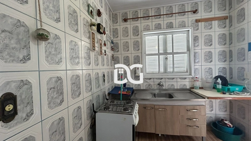 Casa composta de 2 dormitórios: 18ª foto da galeria de imagens do imóvel