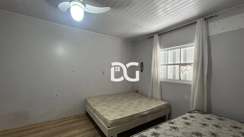 Casa composta de 2 dormitórios: 10ª foto da galeria de imagens do imóvel