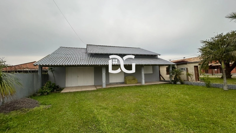 Casa aconchegante, composta por 2 dormitórios bem iluminados: 1ª foto da galeria de imagens do imóvel
