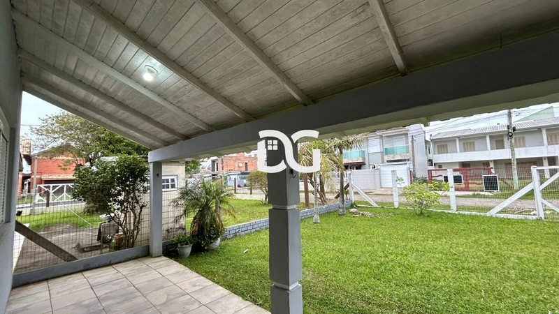 Casa aconchegante, composta por 2 dormitórios bem iluminados: 3ª foto da galeria de imagens do imóvel