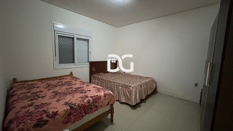 Casa aconchegante, composta por 2 dormitórios bem iluminados: 17ª foto da galeria de imagens do imóvel