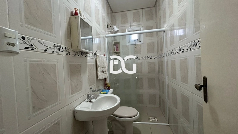 Casa aconchegante, composta por 2 dormitórios bem iluminados: 18ª foto da galeria de imagens do imóvel