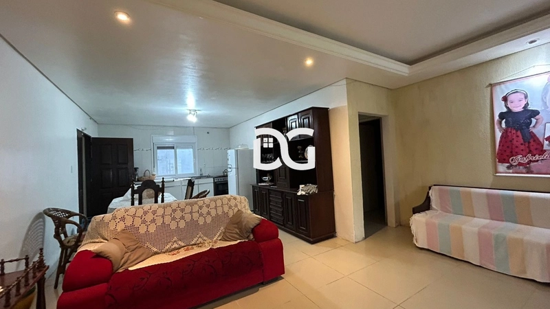 Casa aconchegante, composta por 2 dormitórios bem iluminados: 6ª foto da galeria de imagens do imóvel
