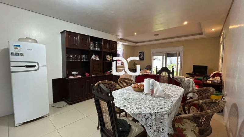 Casa aconchegante, composta por 2 dormitórios bem iluminados: 9ª foto da galeria de imagens do imóvel