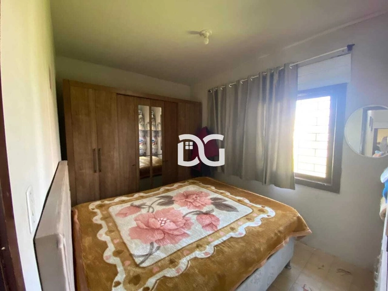 Ampla casa composta por quatro dormitórios proporcionando conforto: 16ª foto da galeria de imagens do imóvel