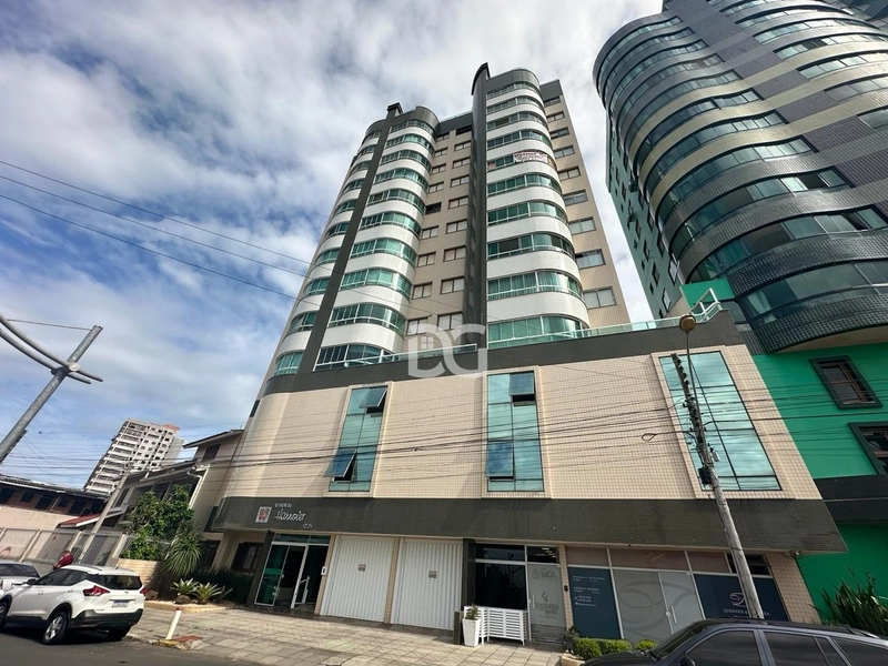 Apartamento de 1 suite e sacada com churrasqueira: 1ª foto da galeria de imagens do imóvel