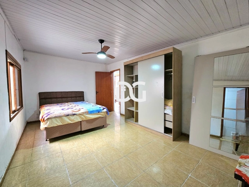 Casa composta de 3 dormitórios: 11ª foto da galeria de imagens do imóvel