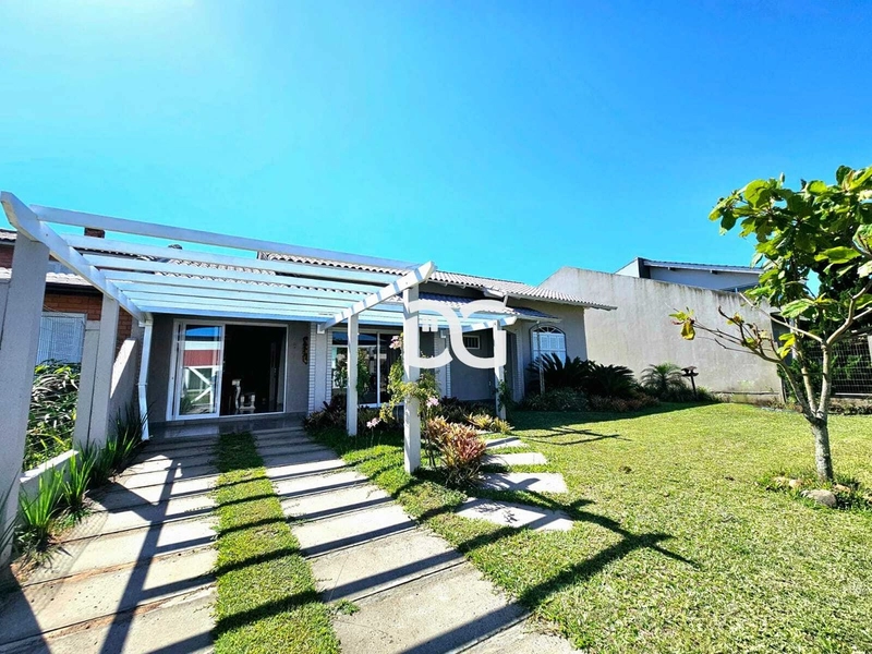 Casa aconchegante e funcional, composta por 3 dormitórios: 2ª foto da galeria de imagens do imóvel