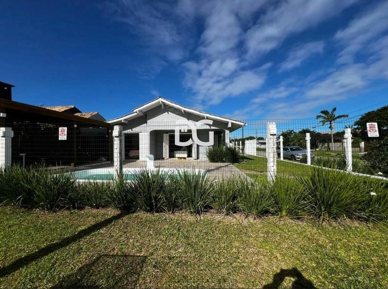 Casa espaçosa e funcional, composta por 5 dormitórios, sendo 2 suítes: 3ª foto da galeria de imagens do imóvel