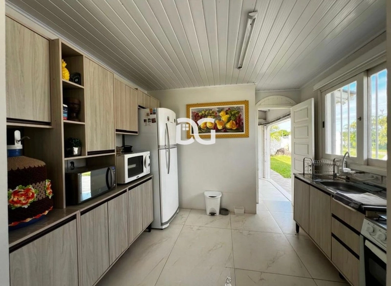 Casa espaçosa e funcional, composta por 5 dormitórios, sendo 2 suítes: 14ª foto da galeria de imagens do imóvel