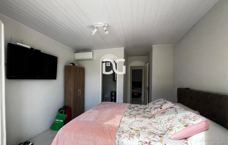 Casa espaçosa e funcional, composta por 5 dormitórios, sendo 2 suítes: 23ª foto da galeria de imagens do imóvel