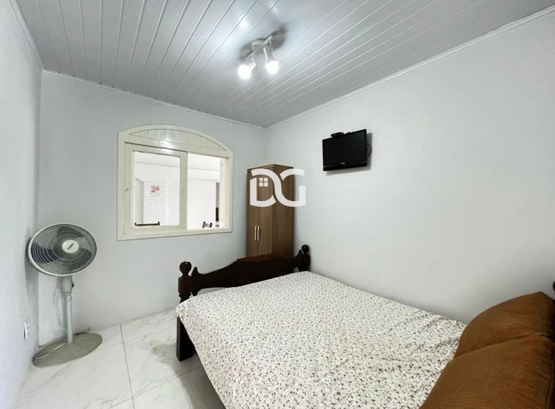 Casa espaçosa e funcional, composta por 5 dormitórios, sendo 2 suítes: 18ª foto da galeria de imagens do imóvel