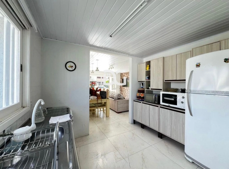 Casa espaçosa e funcional, composta por 5 dormitórios, sendo 2 suítes: 12ª foto da galeria de imagens do imóvel