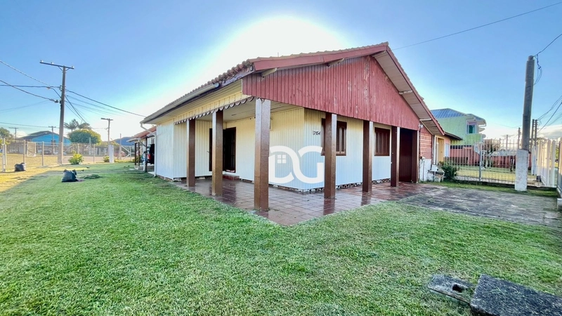 Casa composta por 3 dormitórios: 1ª foto da galeria de imagens do imóvel