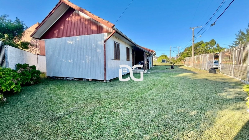 Casa composta por 3 dormitórios: 2ª foto da galeria de imagens do imóvel