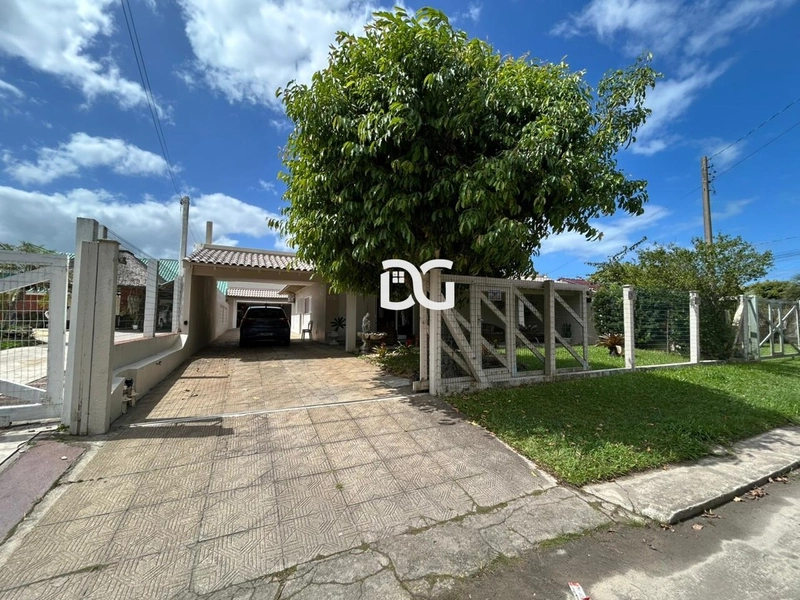 Casa espaçosa e bem distribuída, composta por 3 dormitórios: 2ª foto da galeria de imagens do imóvel