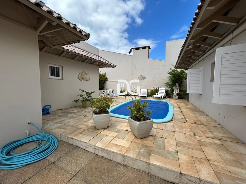 Casa espaçosa e bem distribuída, composta por 3 dormitórios: 26ª foto da galeria de imagens do imóvel