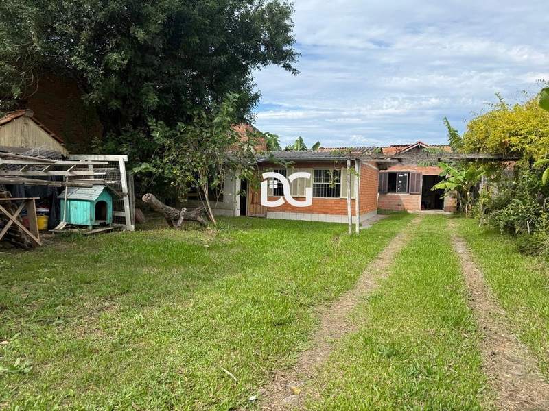 Casa espaçosa e bem distribuída, composta por 3 dormitórios: 1ª foto da galeria de imagens do imóvel