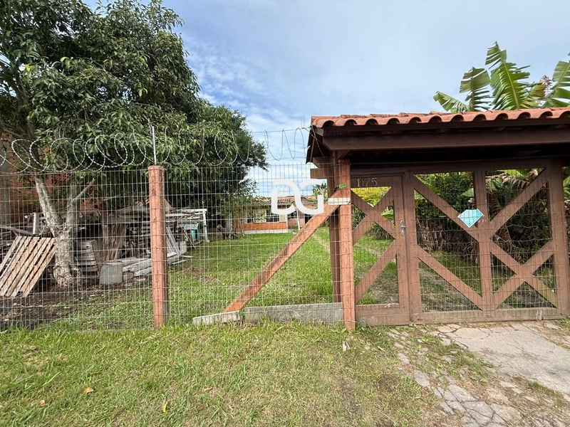 Casa espaçosa e bem distribuída, composta por 3 dormitórios: 3ª foto da galeria de imagens do imóvel