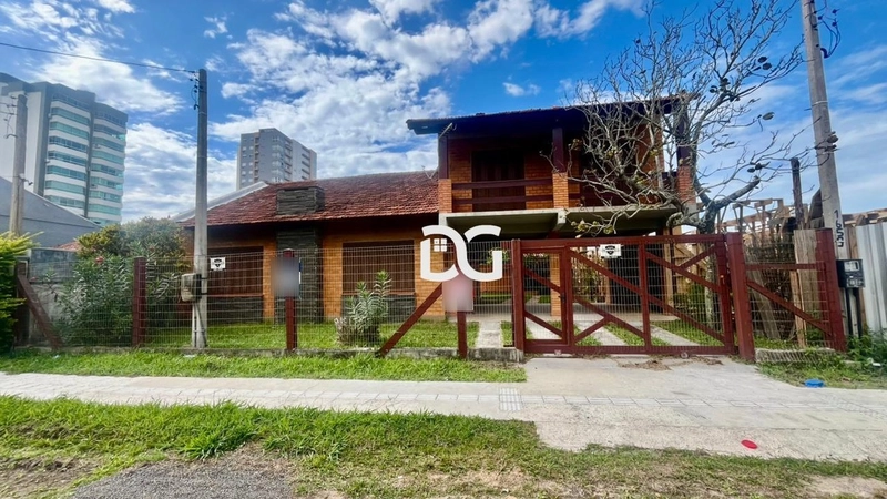 Sobrado bem distribuído, ideal para famílias que buscam conforto: 1ª foto da galeria de imagens do imóvel