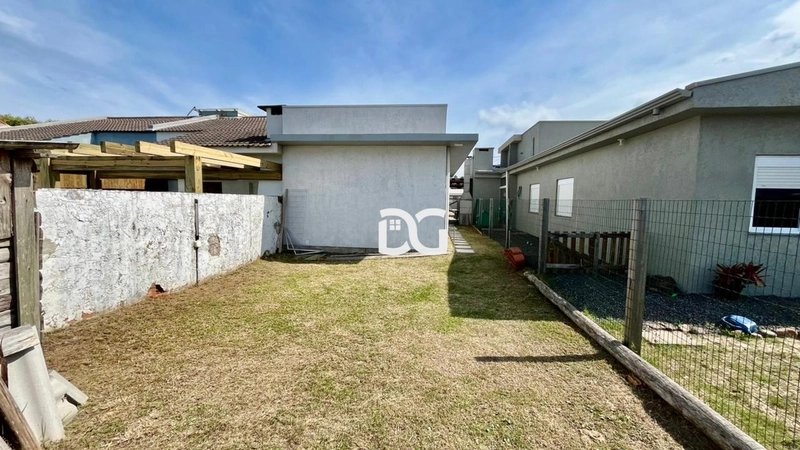 Casa aconchegante e funcional, composta por 3 dormitórios: 13ª foto da galeria de imagens do imóvel