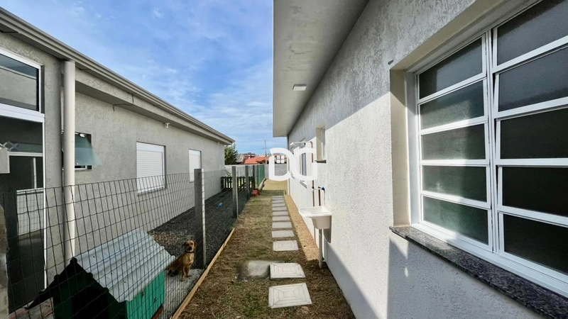 Casa aconchegante e funcional, composta por 3 dormitórios: 12ª foto da galeria de imagens do imóvel