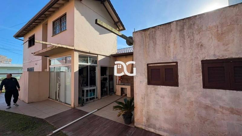 Casa espaçosa e bem distribuída, composta por 3 dormitórios: 22ª foto da galeria de imagens do imóvel