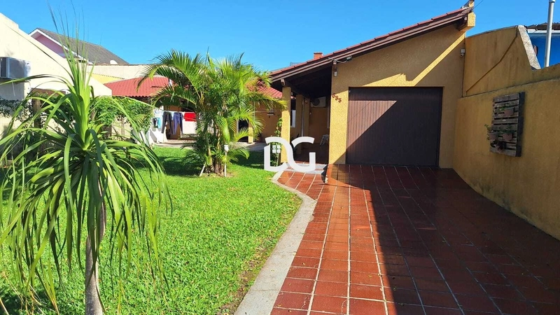 Casa aconchegante e bem distribuída, composta por 3 dormitórios: 2ª foto da galeria de imagens do imóvel