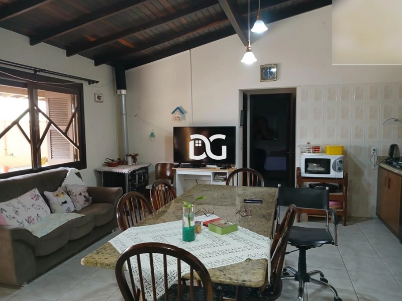 Casa aconchegante e bem distribuída, composta por 3 dormitórios: 8ª foto da galeria de imagens do imóvel