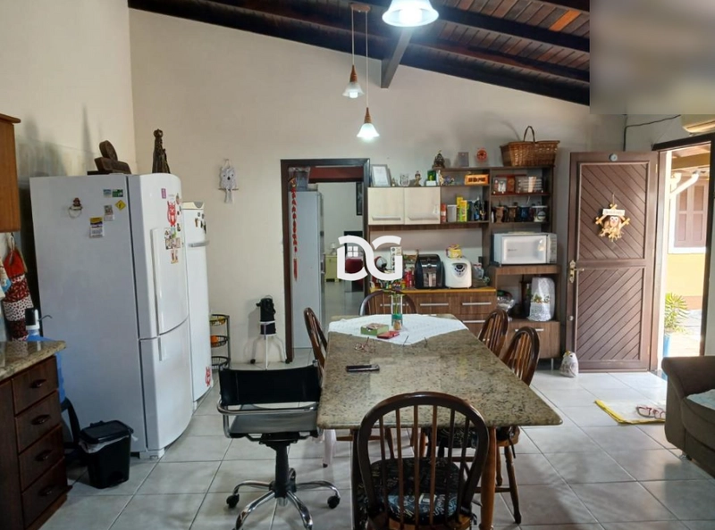Casa aconchegante e bem distribuída, composta por 3 dormitórios: 6ª foto da galeria de imagens do imóvel