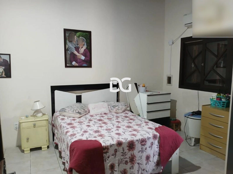 Casa aconchegante e bem distribuída, composta por 3 dormitórios: 12ª foto da galeria de imagens do imóvel